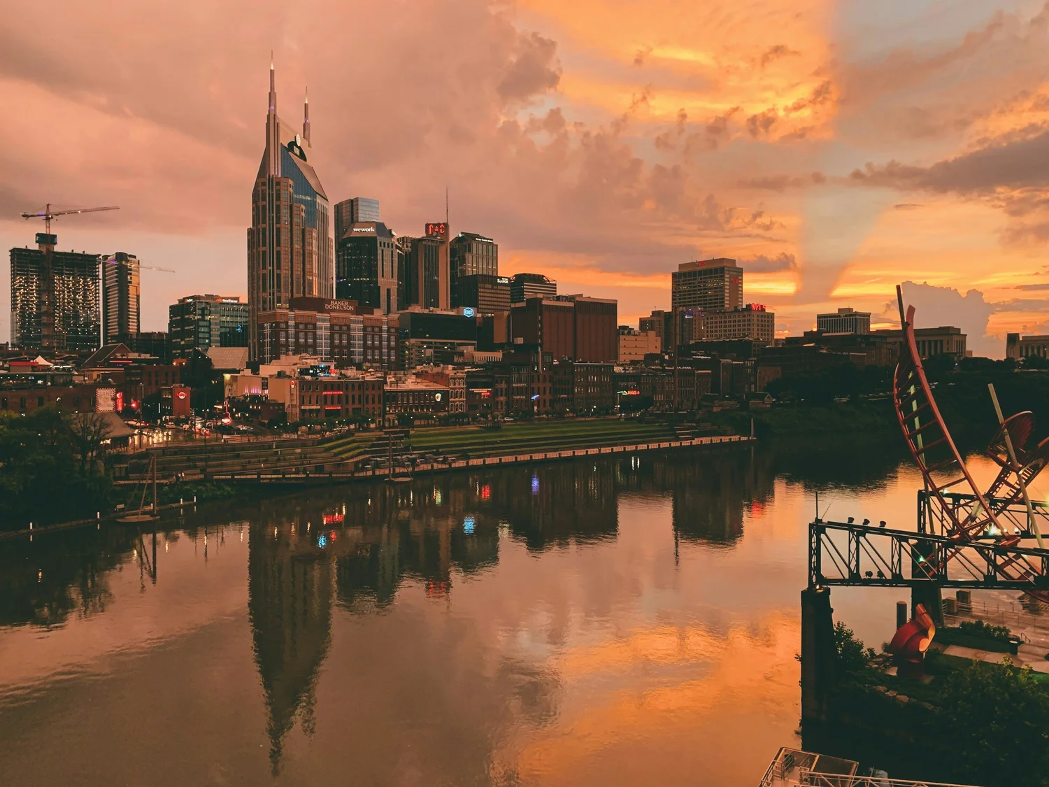 Nashville skyline under a dramatic gold sky